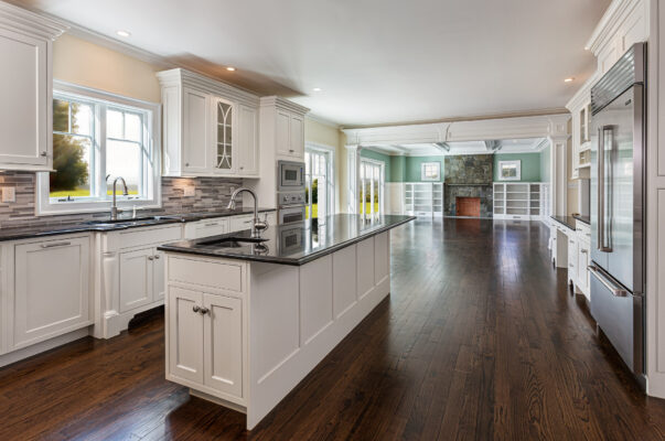 New construction with open floor plan of a kitchen, breakfast nook and living room.